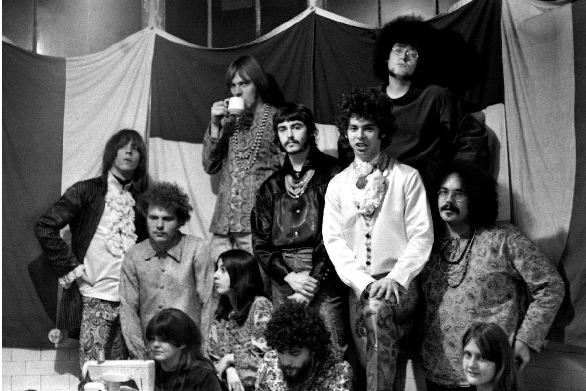 Rock group MC5 pose for a photo with their manager John Sinclair and friends, Detroit, Michigan, 1967