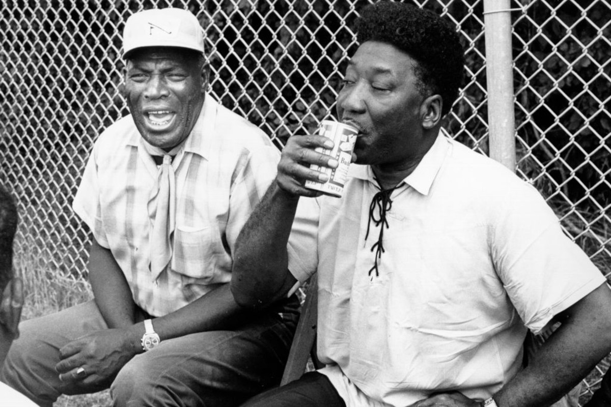 Muddy Waters and Howlin' Wolf relax backstage at the Ann Arbor Blues Festival in August 1969 in Ann Arbor, Michigan