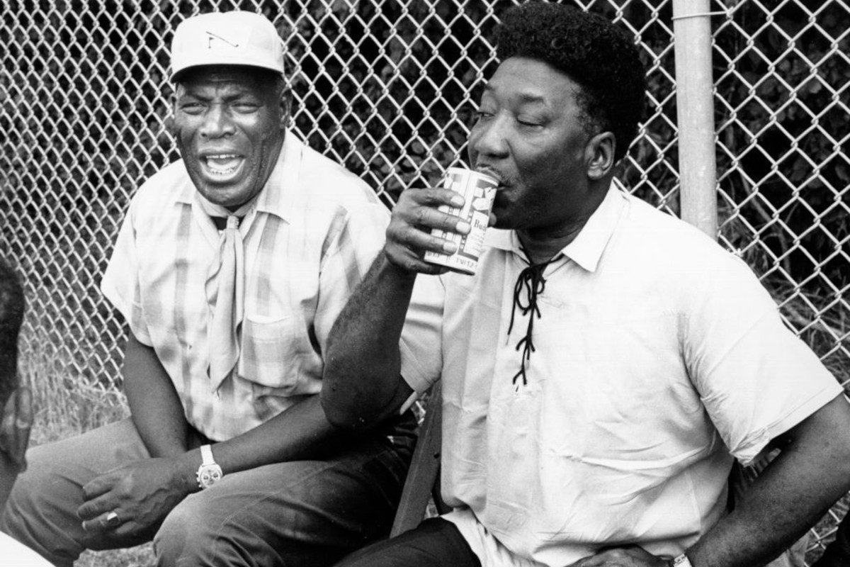 Muddy Waters and Howlin' Wolf relax backstage at the Ann Arbor Blues Festival in August 1969 in Ann Arbor, Michigan