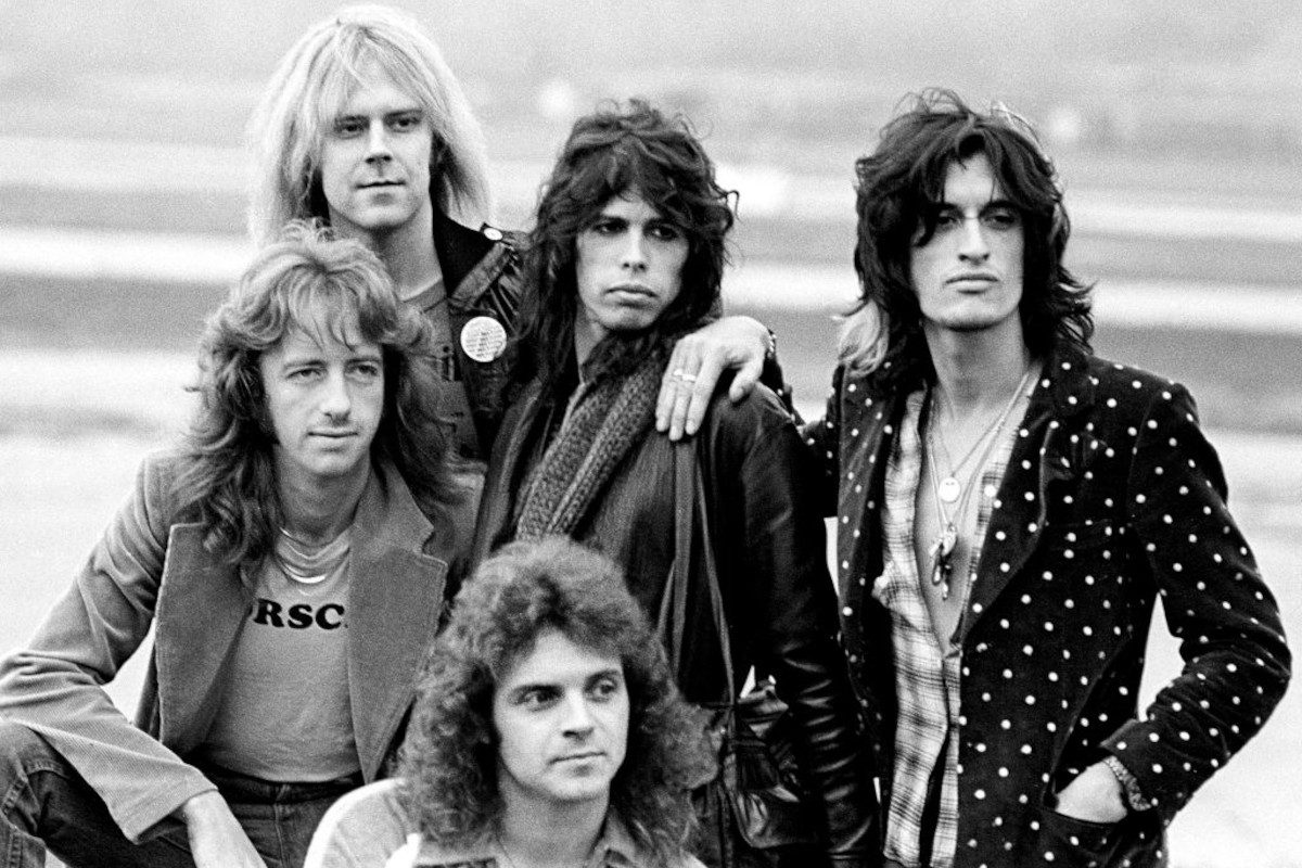 Aerosmith posing for a band portrait, November 1977