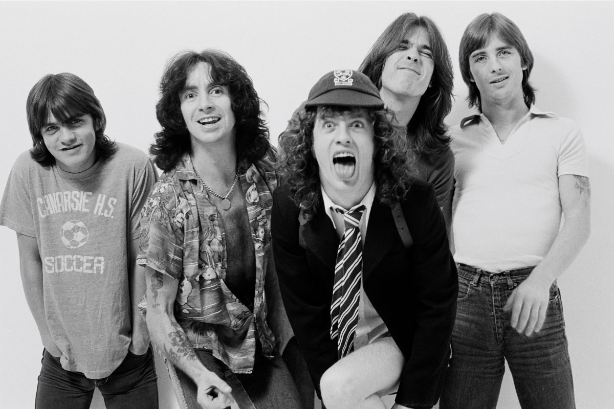 Australian rock band AC/DC posed in a studio in London in August 1979. Left to right: Malcolm Young, Bon Scott, Angus Young, Cliff Williams and Phil Rudd