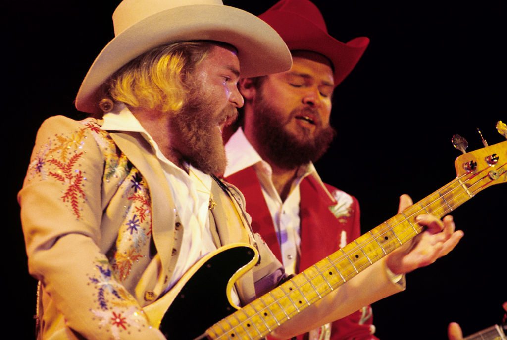 Bassist Dusty Hill and guitarist Billy Gibbons of ZZ Top perform at the Atlanta-Fulton County Stadium on June 5, 1976 in Atlanta, Georgia