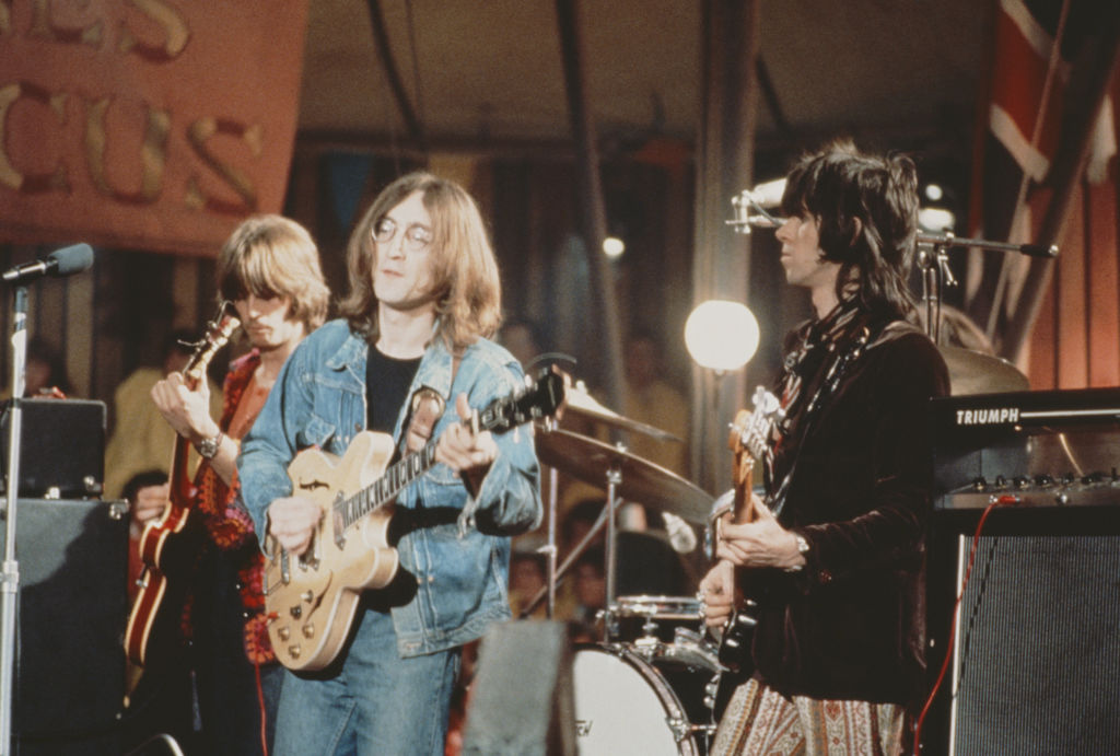 Eric Clapton, John Lennon and Keith Richards perform as The Dirty Mac on the set of the Rolling Stones Rock and Roll Circus at Intertel TV Studio in Wembley, London on 11th December 1968