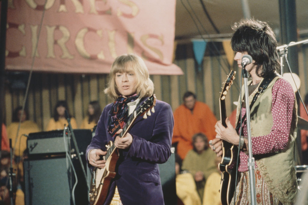 Brian Jones and Keith Richards of The Rolling Stones perform live on stage on the set of the Rolling Stones Rock and Roll Circus at Intertel TV Studio in Wembley, London on 11th December 1968