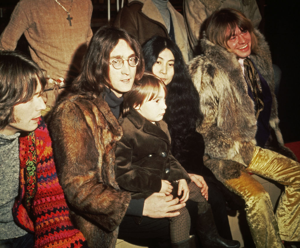 British musicians Eric Clapton, John Lennon (1940 - 1980) - with his wife, artist Yoko Ono and his son Julian - and Brian Jones (1942 - 1969) pictured at a press conference at Internel Studios in Stonebridge Park, Wembley, for the Rolling Stones' Rock & Roll Circus project