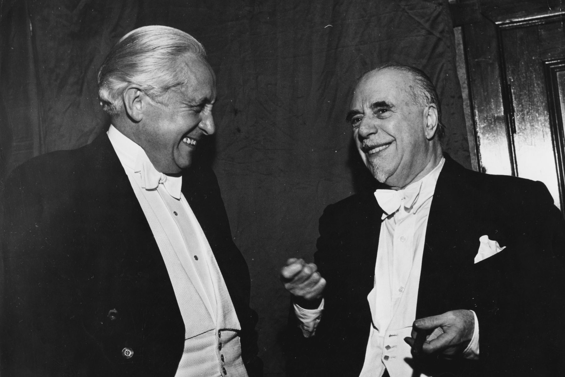 Musical producer Carl Ebert (left) and conductor Sir Thomas Beecham, chatting at the Edinburgh Festival, circa 1950