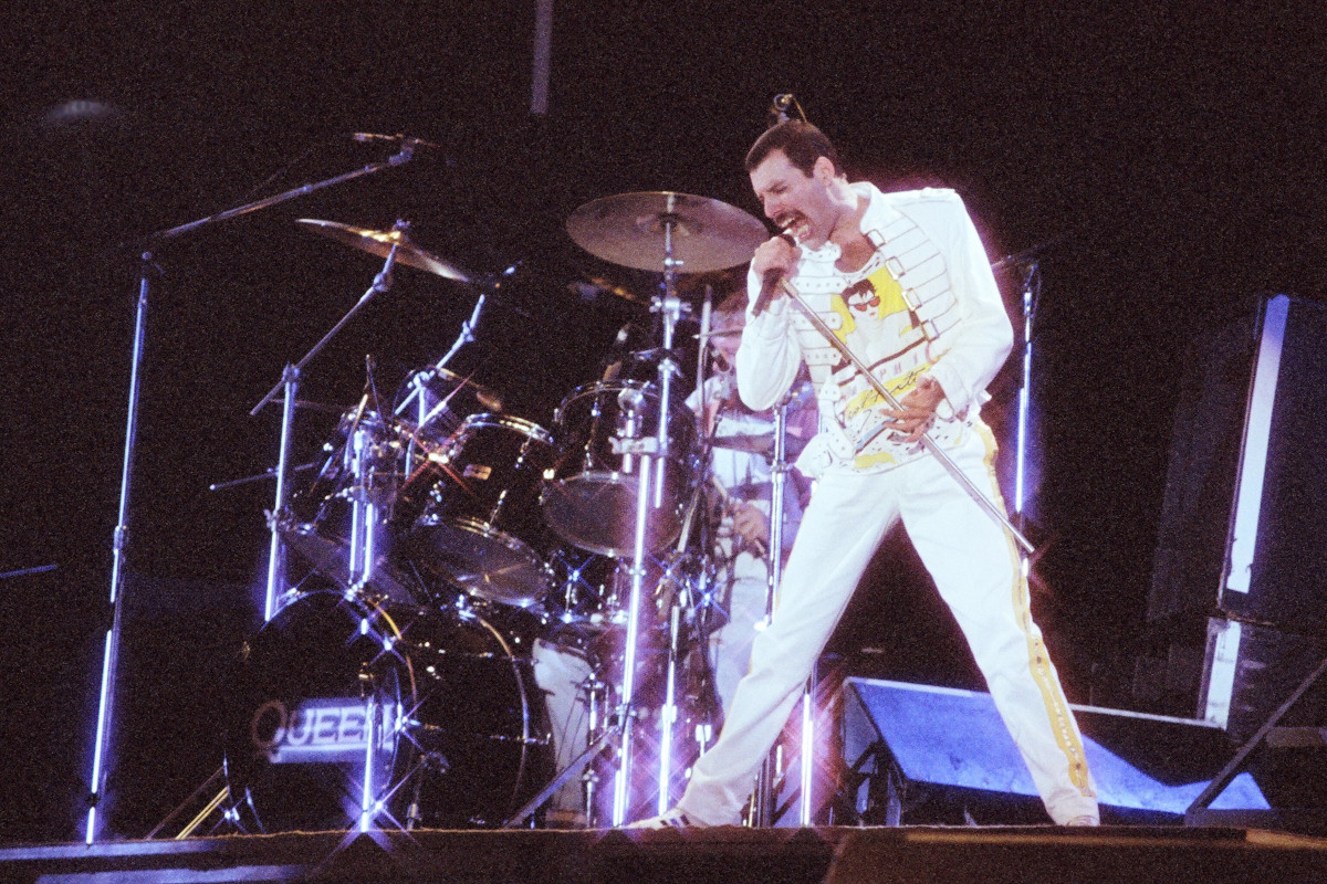 Freddie Mercury performing live on stage