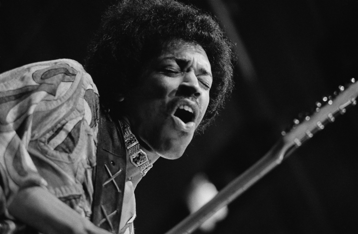 Rock guitar virtuoso Jimi Hendrix (1942 - 1970) caught mid guitar-break during his performance at the Isle of Wight Festival, August 1970