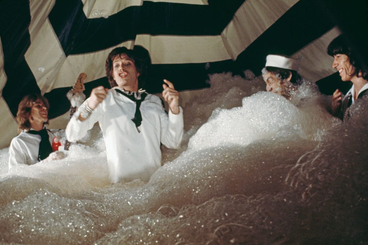 The Rolling Stones pose during the production of their music video for 'It's Only Rock 'n Roll (But I Like It)' in June 1974