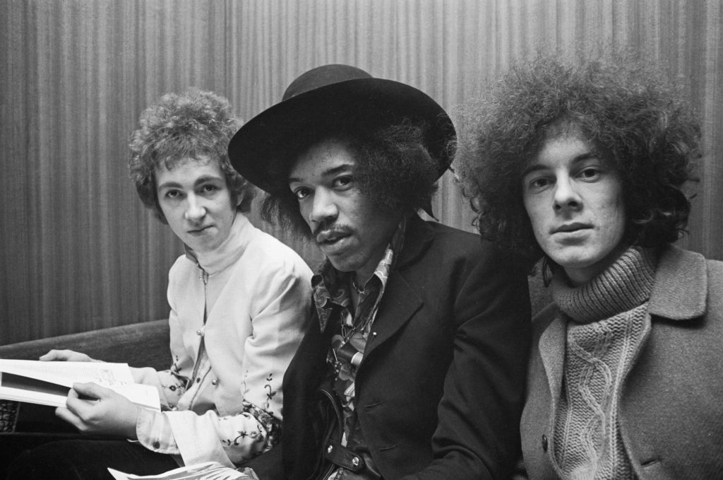Jimi Hendrix flanked by drummer Mitch Mitchell and bassist Noel Redding, 1967