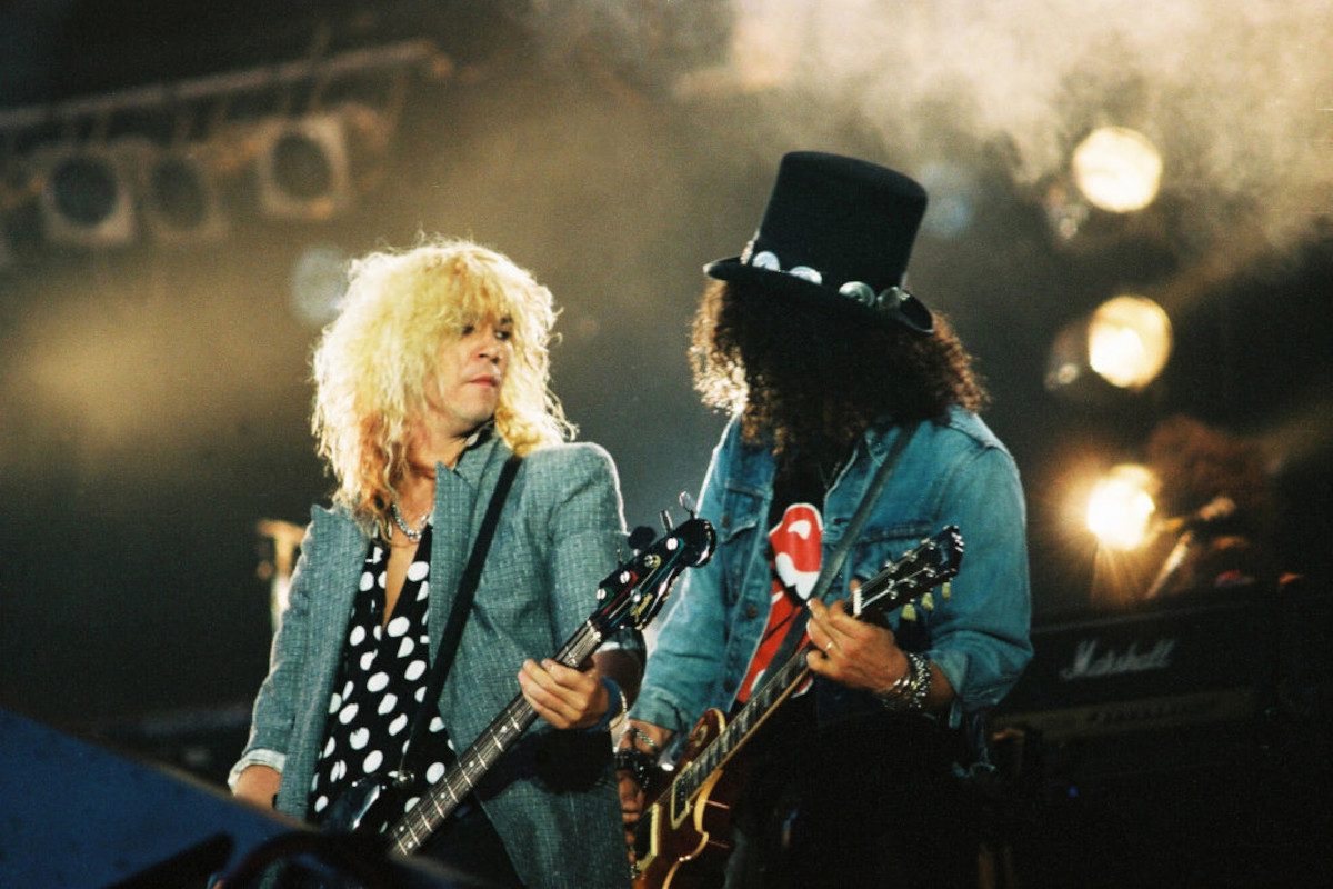 Duff McKagan and Slash of Guns n Roses perform on stage at The Freddie Mercury Tribute Concert at Wembley Stadium on April 20th, 1992 in London, United Kingdom