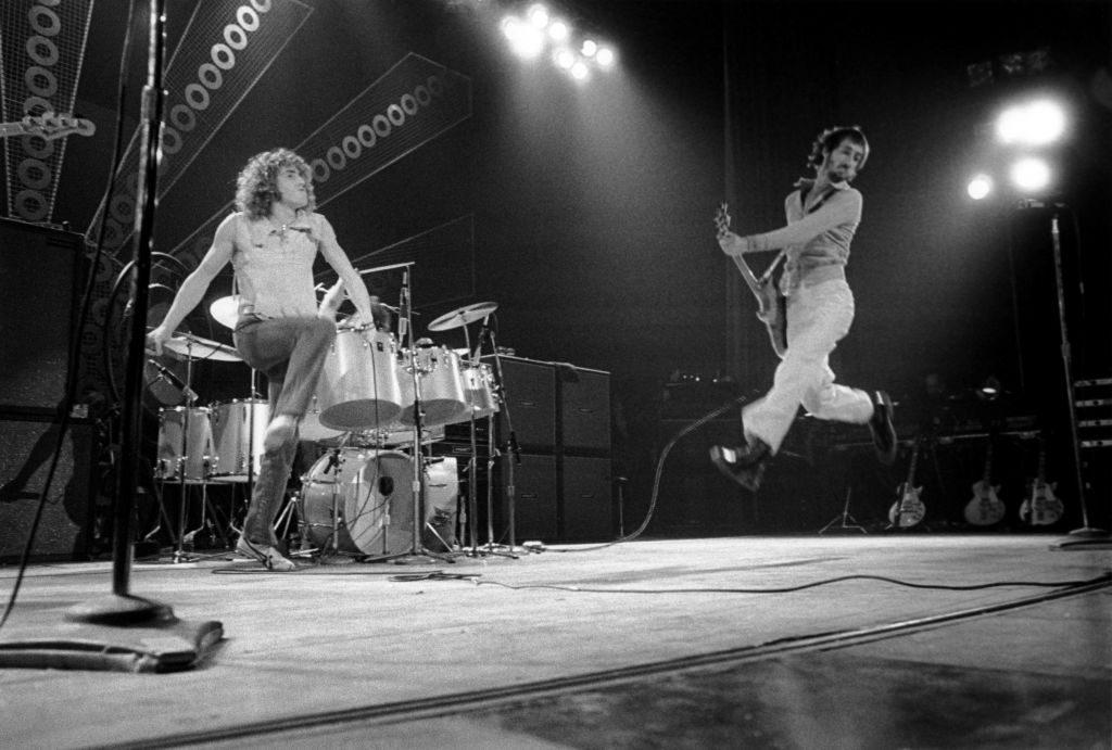 Roger Daltrey and an airborne Pete Townshend of The Who, live on stage at The Lyceum in London during the Quadrophenia tour on 11 November 1973