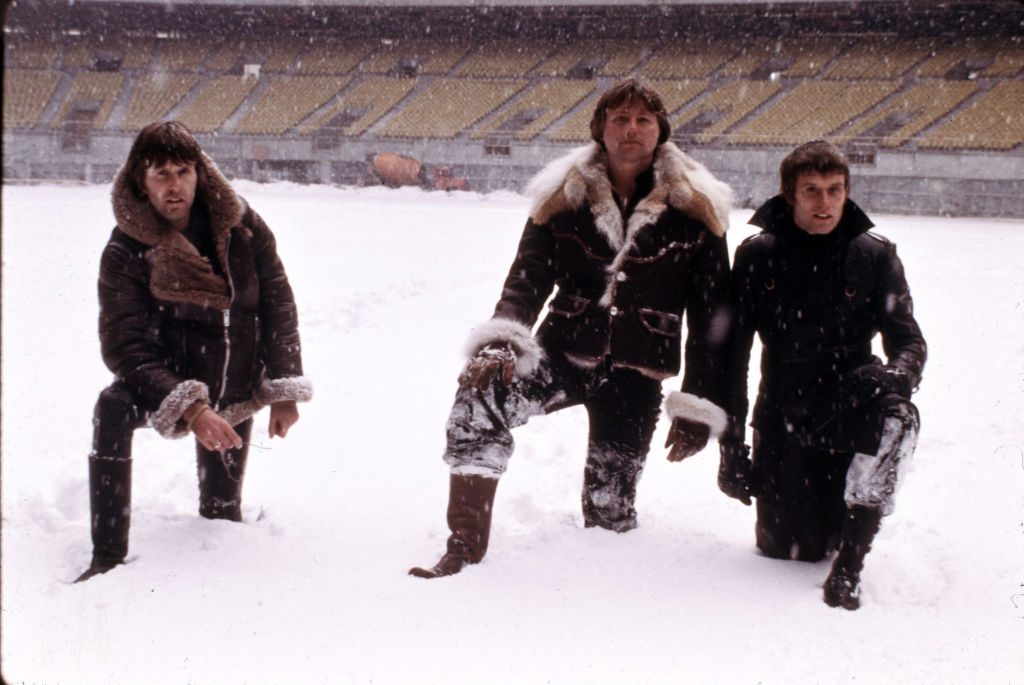 English progressive rock group Emerson Lake and Palmer during rehearsals for the band's 'Works' tour, at the Olympic Stadium, Montreal, Canada, February 1977. Left to right: keyboard player Keith Emerson, guitarist Greg Lake and drummer Carl Palmer