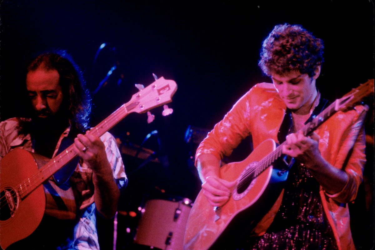 John McVie and Lindsey Buckingham performing live onstage for Fleetwood Mac, 1978