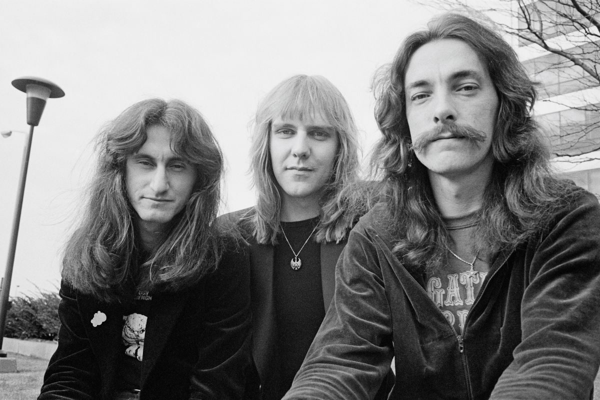 Rush in Cleveland, Ohio, December 1977. From left: bassist Geddy Lee, guitarist Alex Lifeson, drummer Neil Peart