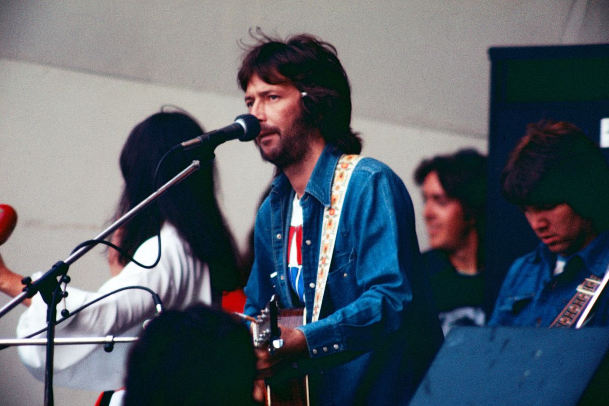 Eric Clapton performing with Yvonne Elliman and George Terry at Crystal Palace Garden Party, London, United Kingdom, 31st July 1976