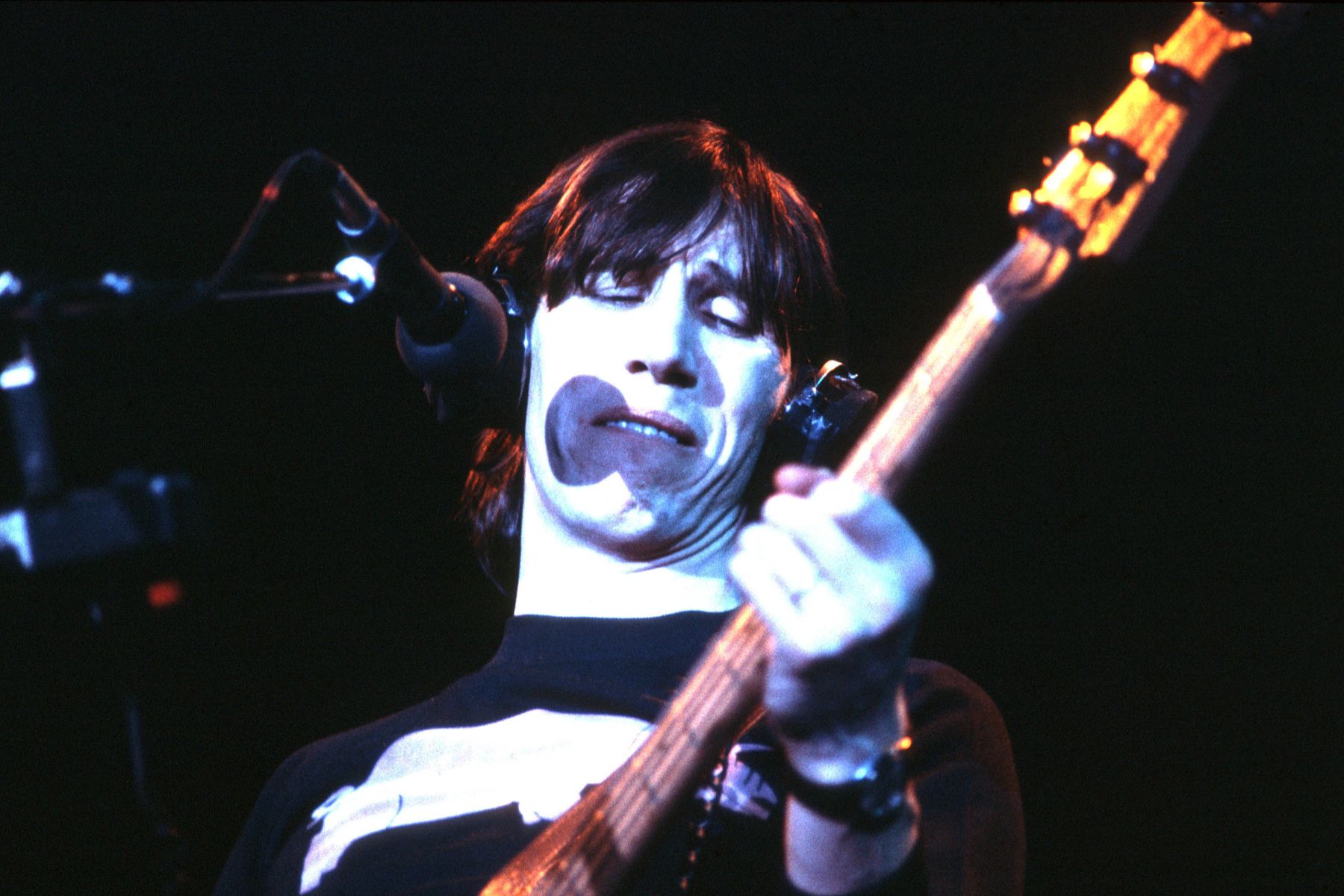 Roger Waters of Pink Floyd performing on stage at Wembley Arena, London, 16 March 1977