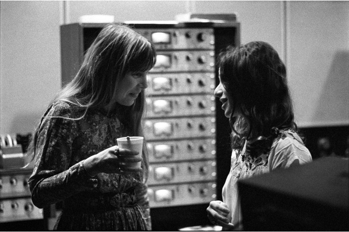 Joni Mitchell talks to Carole King in the control room of A&M Records Recording Studio during the recording of King's album 'Tapestry', January 1971