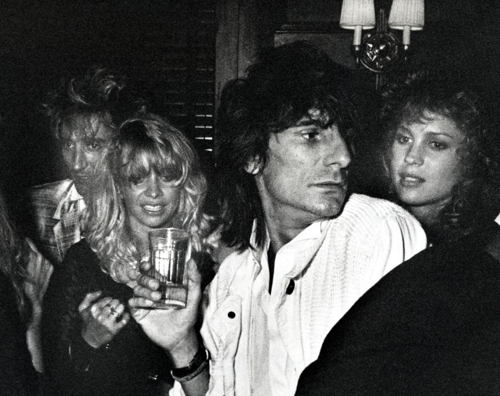 Ronnie Wood with his girlfriend (later wife) Jo and Rod Stewart, at the 1984 MTV Awards after party