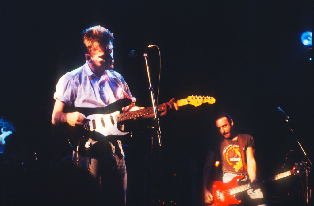 New Order's Bernard Sumner and Peter Hook onstage in Leuven, Belgium, December 17 1985