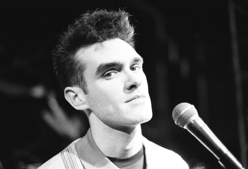 Morrissey, lead singer of Manchester group The Smiths, performing in concert, 1984