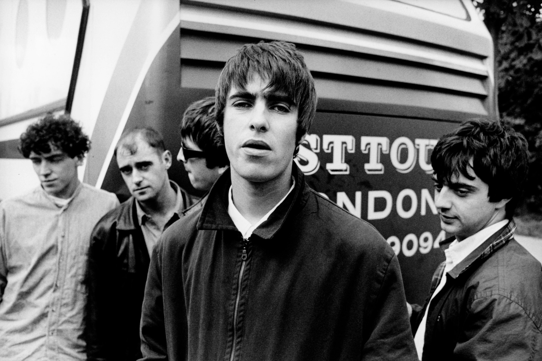 Photo of Oasis, L-R: Tony McCarroll, Paul 'Bonehead' Arthurs, Noel Gallagher, Liam Gallagher, Paul 'Guigsy' McGuigan - posed, group shot, 1994