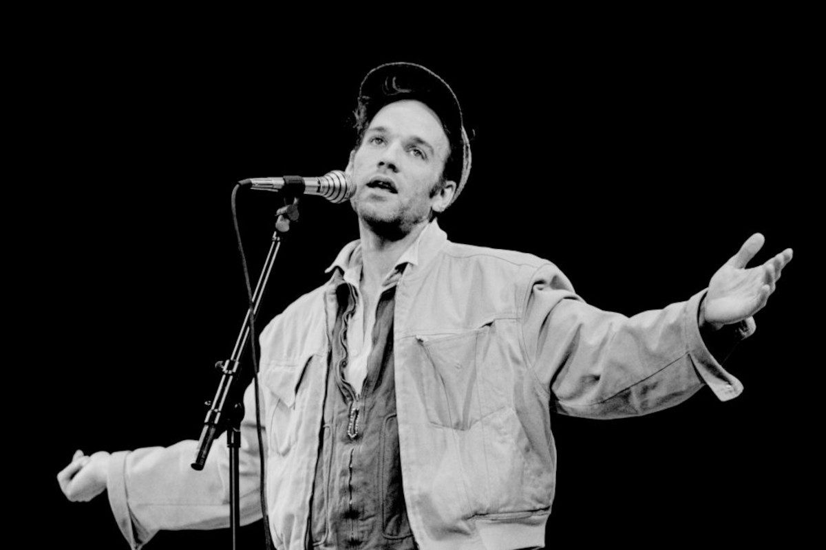 Michael Stipe from REM performs live on stage in the Netherlands on 11th March 1991