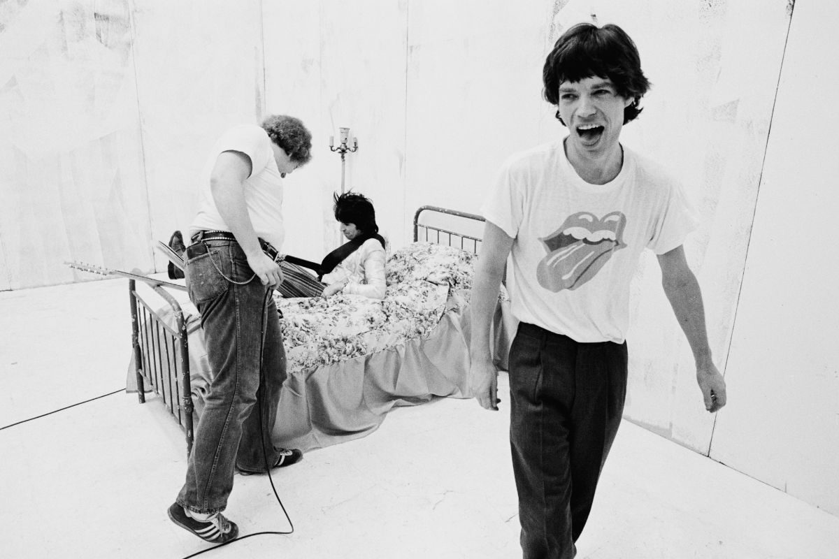 Keith Richards (on bed) and Mick Jagger recording a video for 'Respectable', 1978