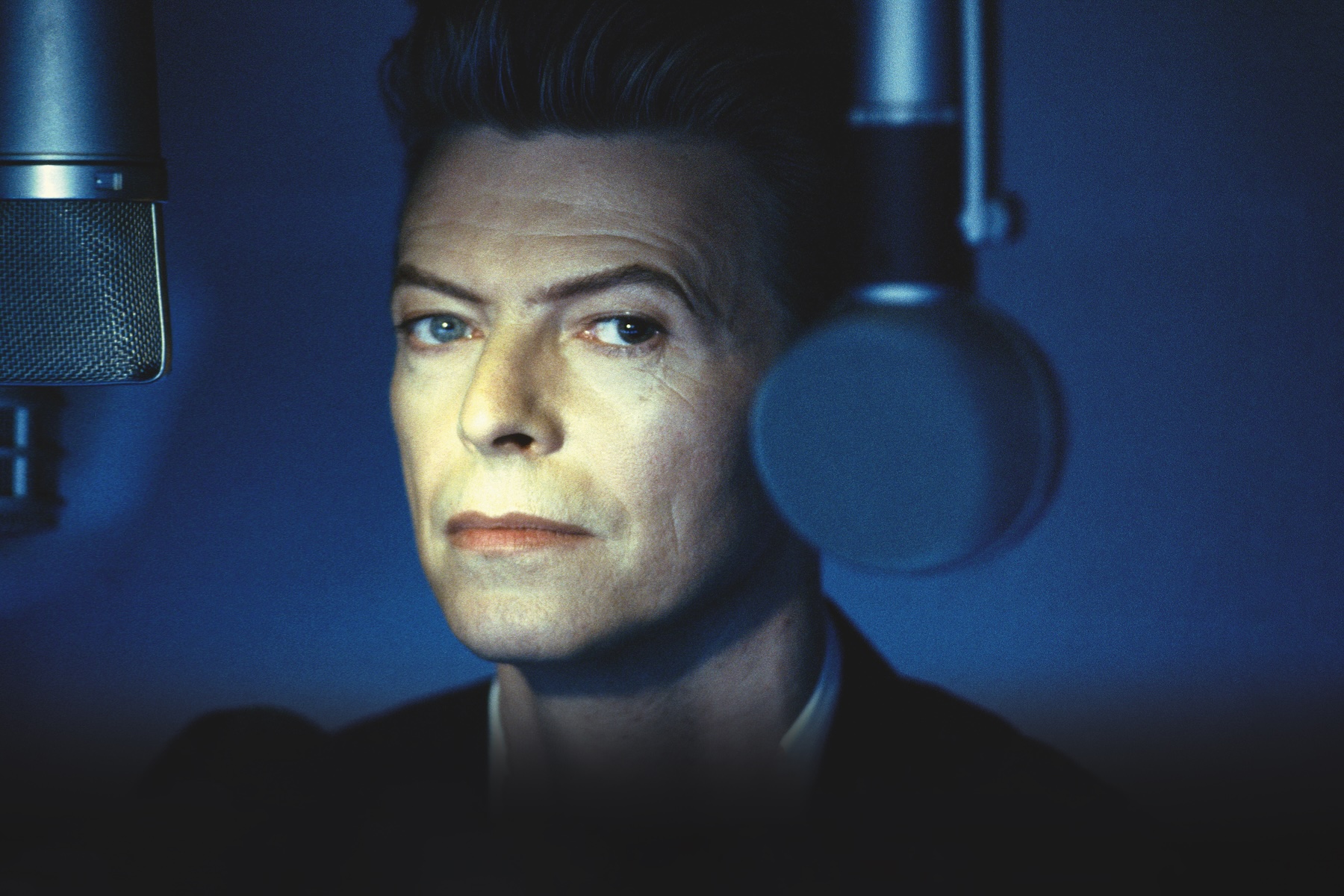 English singer David Bowie (1947 - 2016) performs on the set of his music video Jump They Say in Los Angeles, California, March 1993