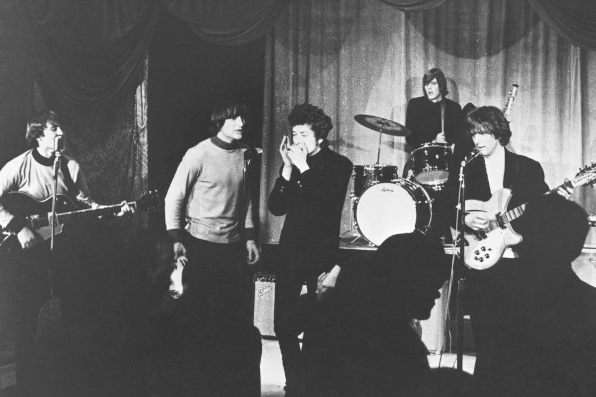 The Byrds performing onstage at Ciro's Nightclub with Bob Dylan on harmonica in 1965 in Los Angeles, California