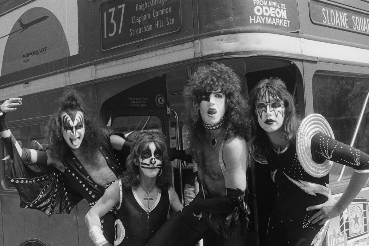 American heavy metal group Kiss posing on a double decker bus, London, 10th May 1976. The band are in London for their first UK appearances. Left to right: Gene Simmons, Peter Criss, Paul Stanley and Ace Frehley