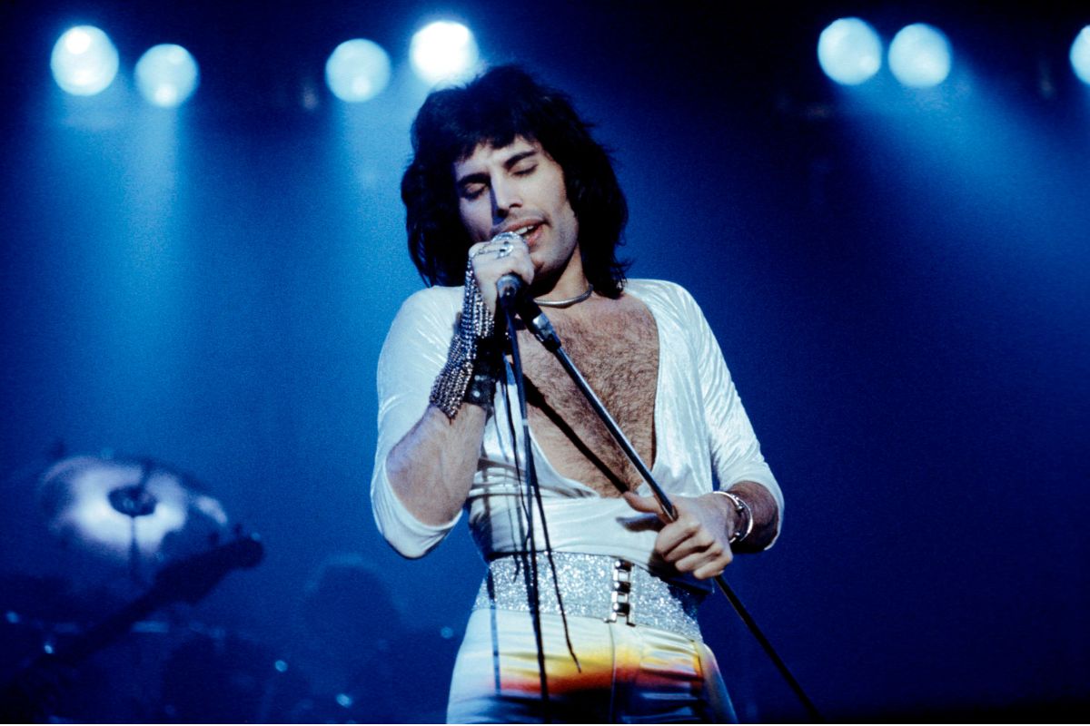 Freddie Mercury performing onstage 1975