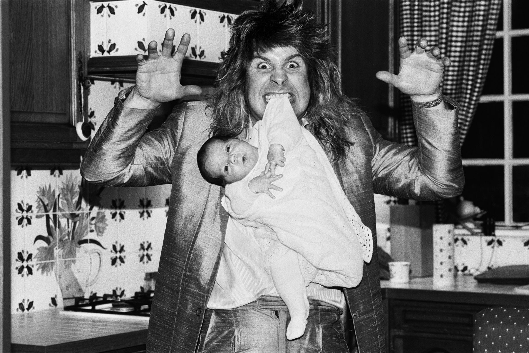 Ozzy Osbourne with his baby boy Jack, 25 November 1985