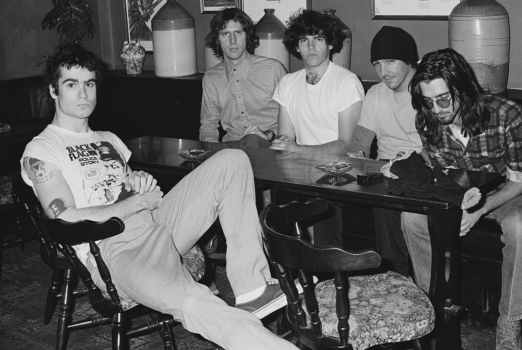 Hardcore punk band Black Flag, group portrait, at the Oporto pub, Holborn, London, United Kingdom, 1983. L-R Henry Rollins, Greg Ginn, Bill Stevenson, Chuck Dukowski, Dez Cad